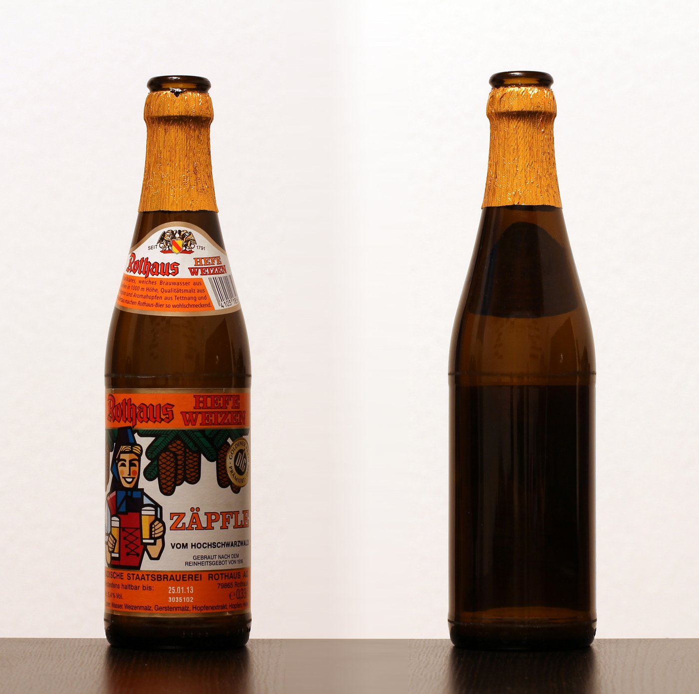 A German Hefeweizen — hazy, pale, and topped with dense foam; its banana-and-clove character comes almost entirely from the yeast.