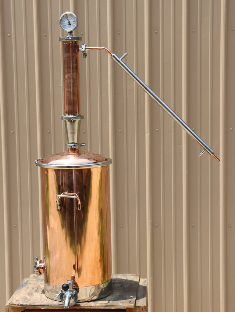 Affordable Distillery Equipment 13-gallon copper still with 2" copper-and-stainless reflux column — the budget-quality Tier-2 entry at $952 (reference only, vendor copyright)