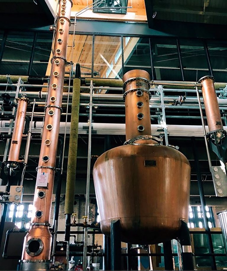 Vendome Copper & Brass Works custom pot-and-column still at J. Rieger & Co. Distillery (Kansas City) — illustrating the traditional hand-built copper construction that Vendome has produced for craft distilleries since the early 20th century. Vendome stills appear in many of the most awarded American whiskey and craft spirits brands (reference only, third-party photo)